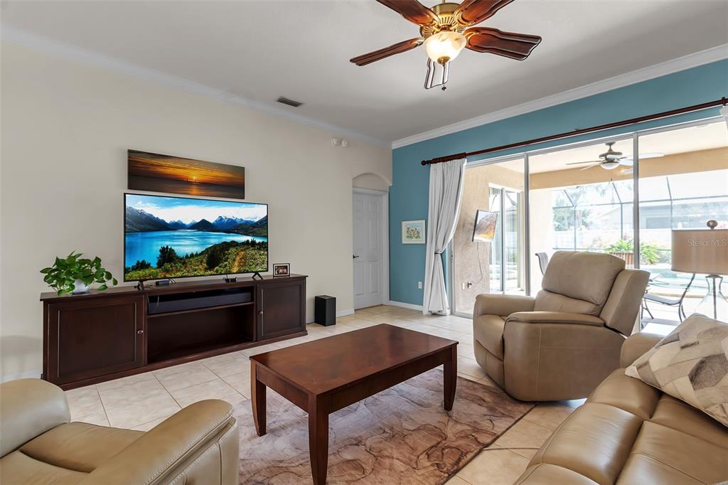 730 Old Quarry Road Bradenton, FL 34212 - Photo 17 of 65 a living room with furniture and a large window