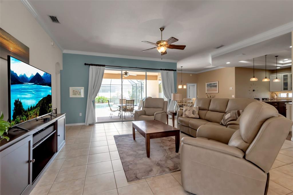 730 Old Quarry Road Bradenton, FL 34212 - Photo 18 of 65 a living room with furniture and a flat screen tv