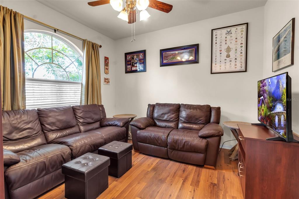 730 Old Quarry Road Bradenton, FL 34212 - Photo 41 of 65 a living room with furniture a flat screen tv and a window