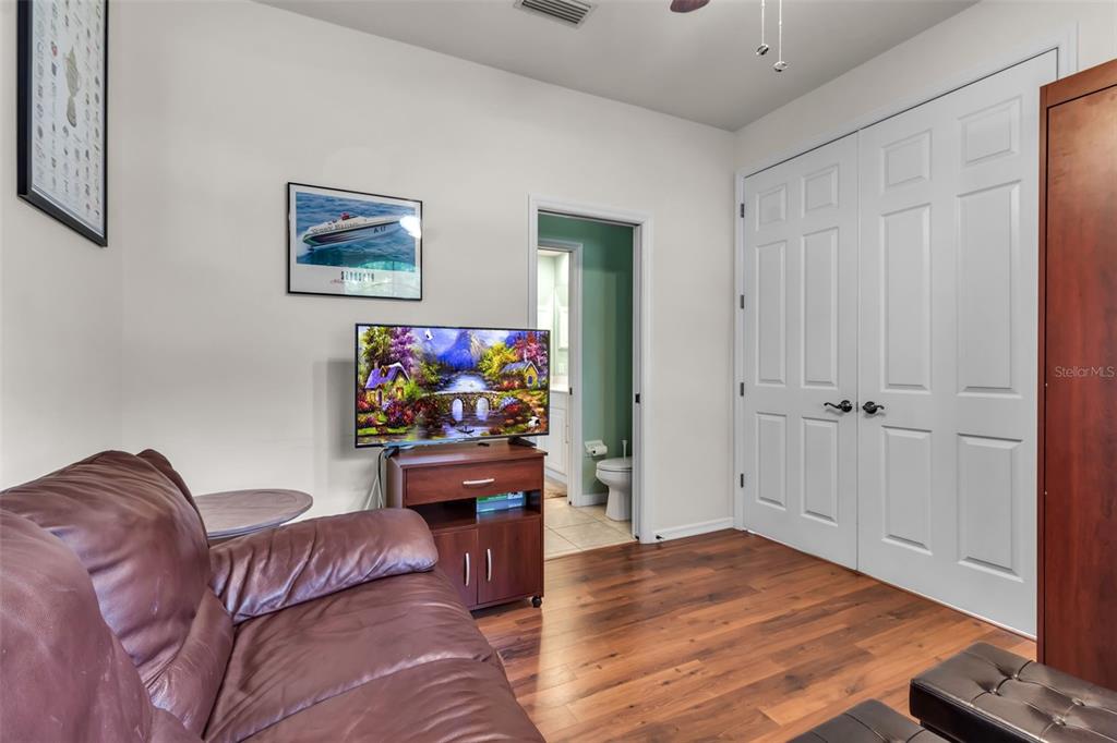 730 Old Quarry Road Bradenton, FL 34212 - Photo 43 of 65 a living room with furniture and a flat screen tv