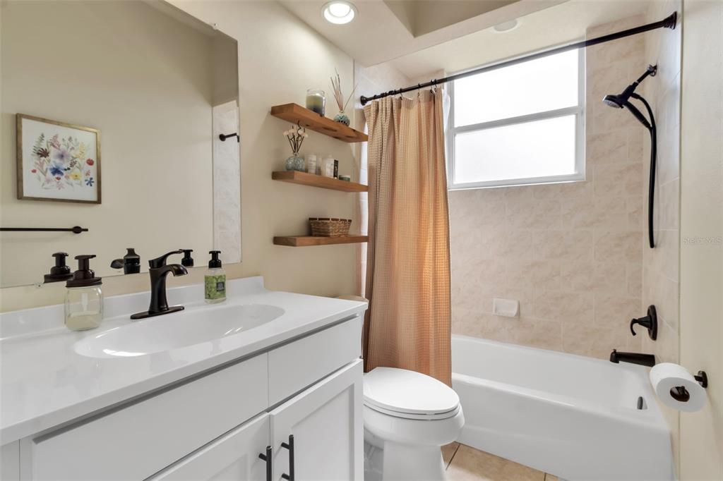 730 Old Quarry Road Bradenton, FL 34212 - Photo 47 of 65 a bathroom with a sink a toilet and a bathtub