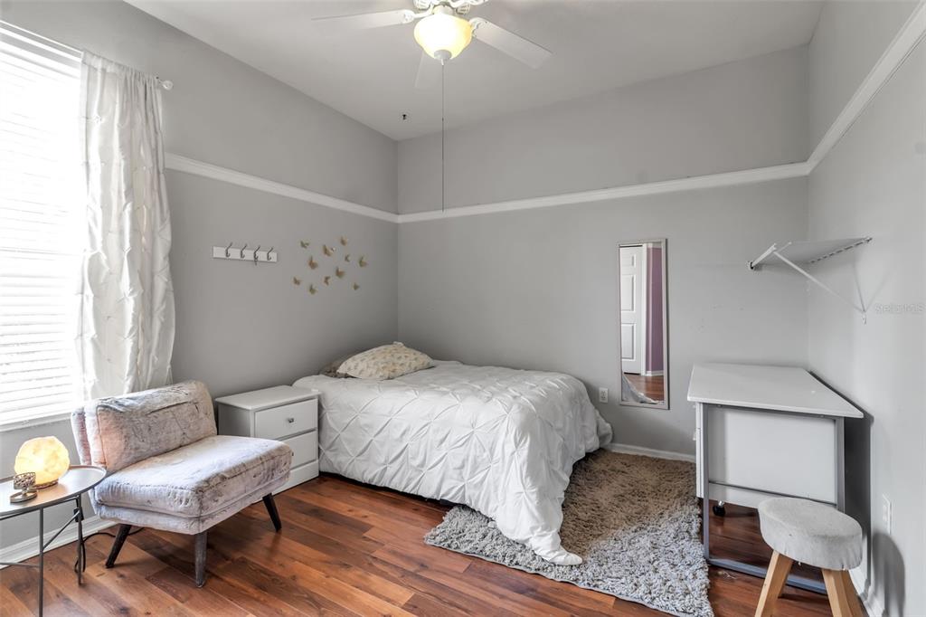 730 Old Quarry Road Bradenton, FL 34212 - Photo 49 of 65 a bedroom with a bed chair and a window