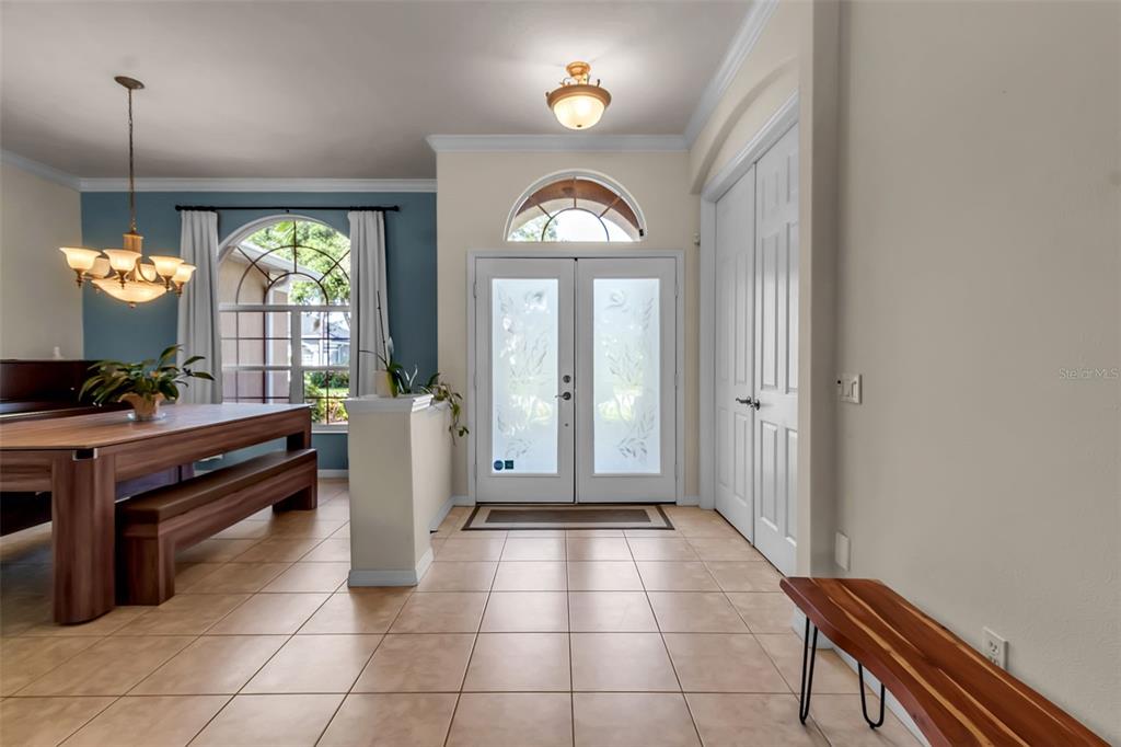 730 Old Quarry Road Bradenton, FL 34212 - Photo 8 of 65 a view of a hallway with entryway dining room and livingroom view