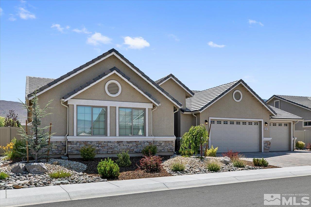 9934 Autumn Sage Drive Reno, NV 89521 - Photo 2 of 39 front view of a house with a yard