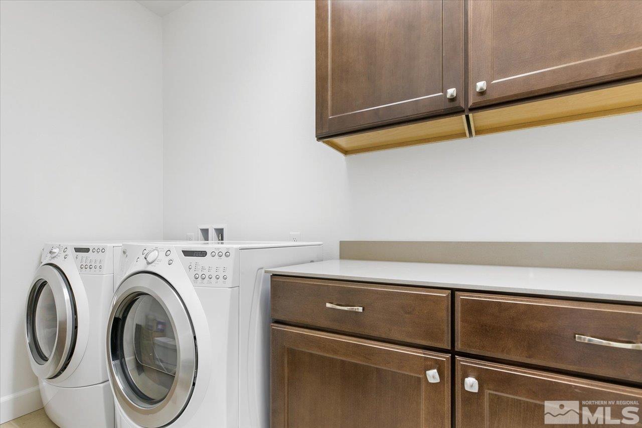 9934 Autumn Sage Drive Reno, NV 89521 - Photo 34 of 39 a close up view of washer and dryer
