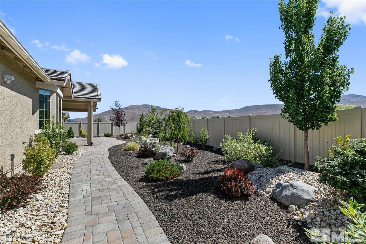 9934 Autumn Sage Drive Reno, NV 89521 - Photo 37 of 39 a garden with a table and a chairs