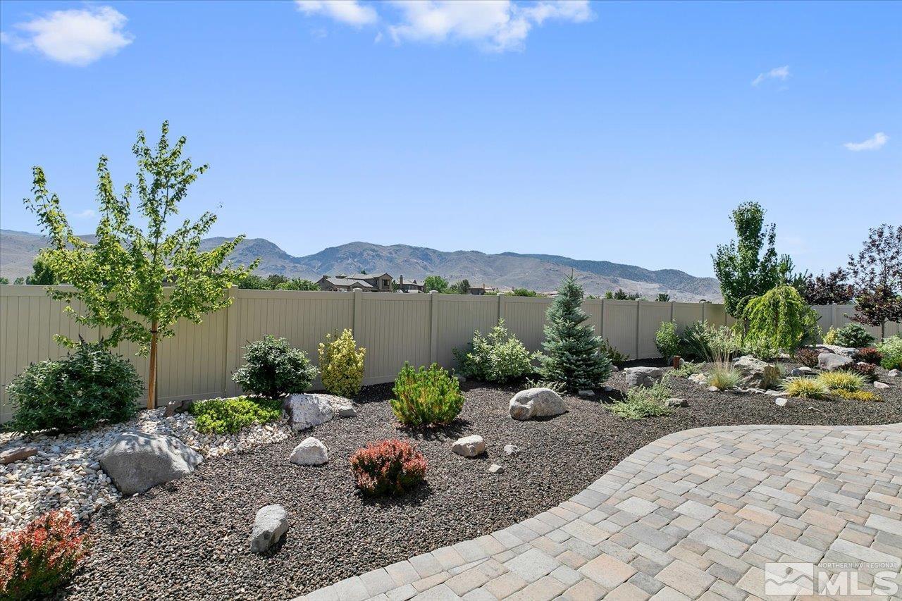 9934 Autumn Sage Drive Reno, NV 89521 - Photo 39 of 39 a view of a lake with a mountain in front of it
