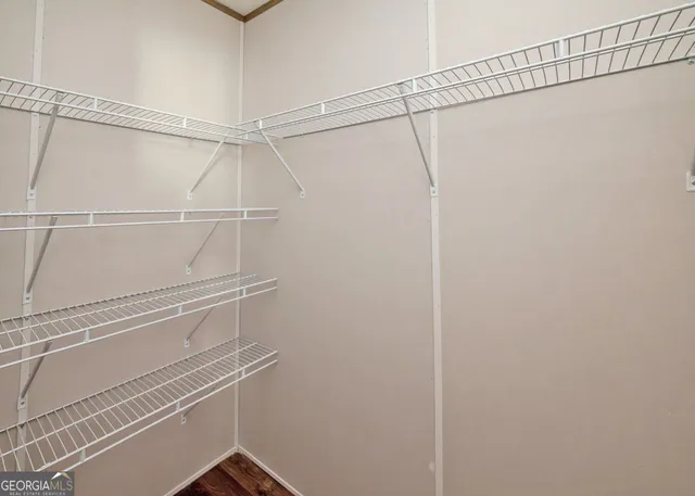 a view of a room with racks on the wall