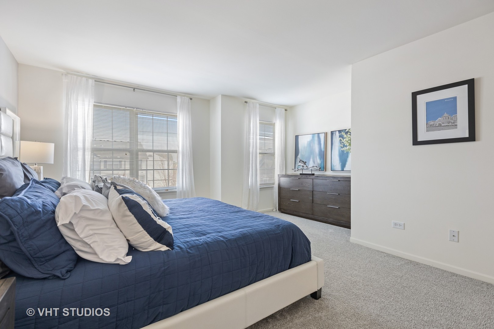 112 Gershwin Court, Unit 112 Wheaton, IL 60189 - Photo 42 of 60 a bedroom with a bed and wooden floor