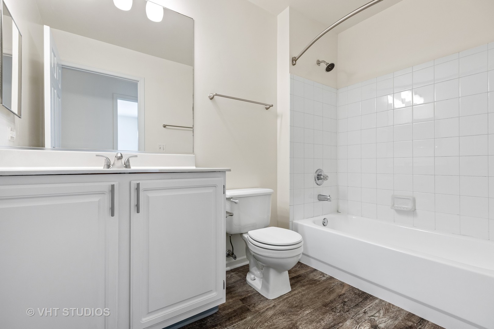 112 Gershwin Court, Unit 112 Wheaton, IL 60189 - Photo 50 of 60 a bathroom with a sink toilet and shower