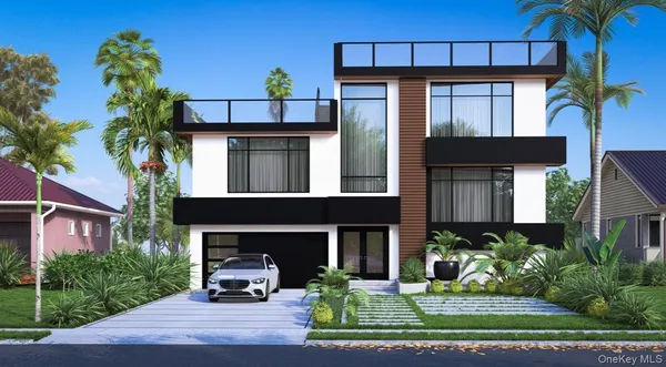 a front view of a house with a yard and potted plants