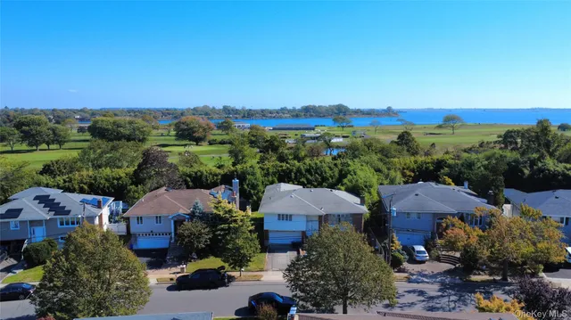 an aerial view of a house with a garden