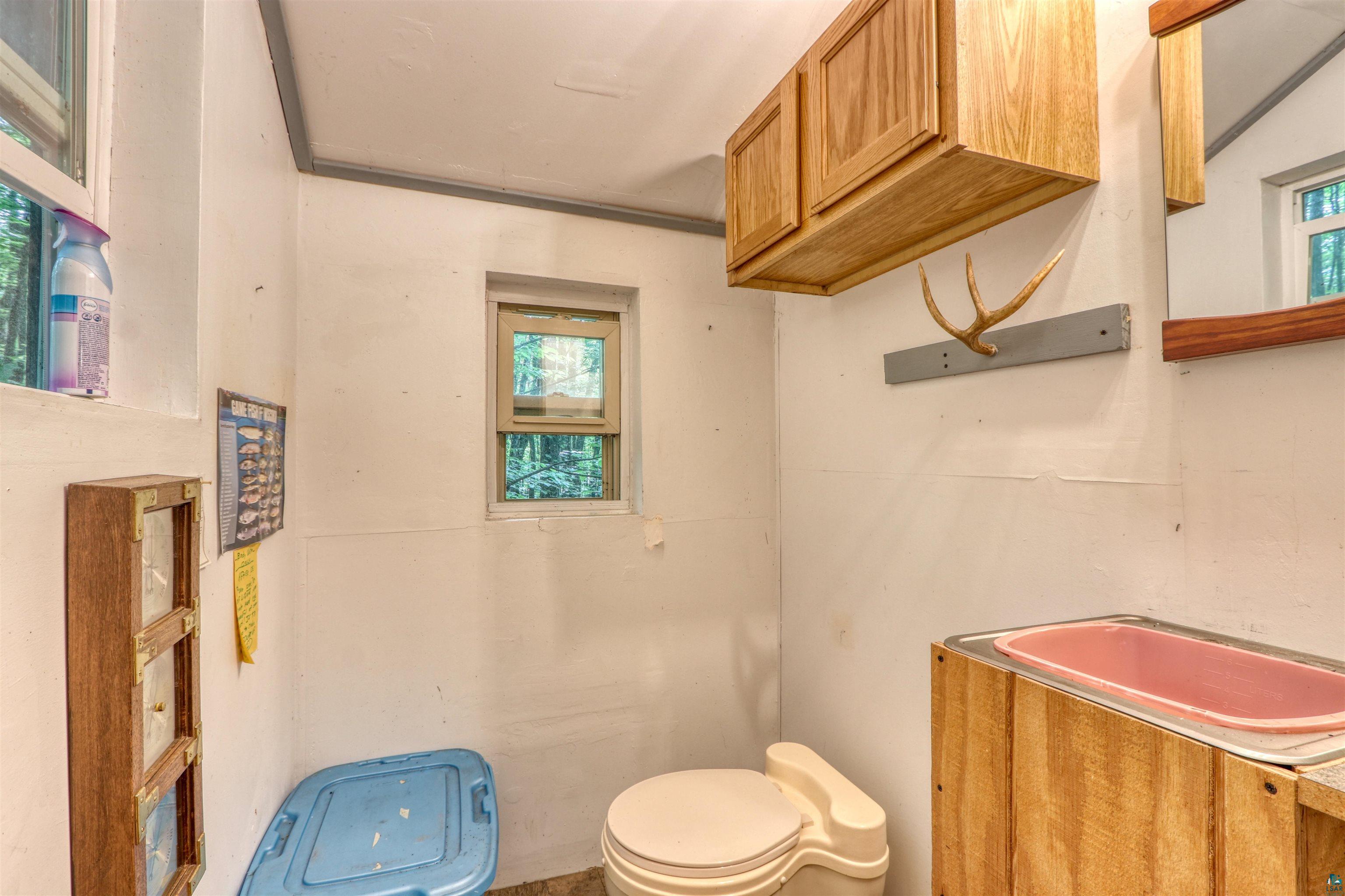 6676 Golf Course Road Winter, WI 54896 - Photo 30 of 51 Half bath featuring toilet