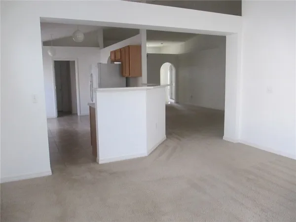 a view of empty room with a washer and dryer