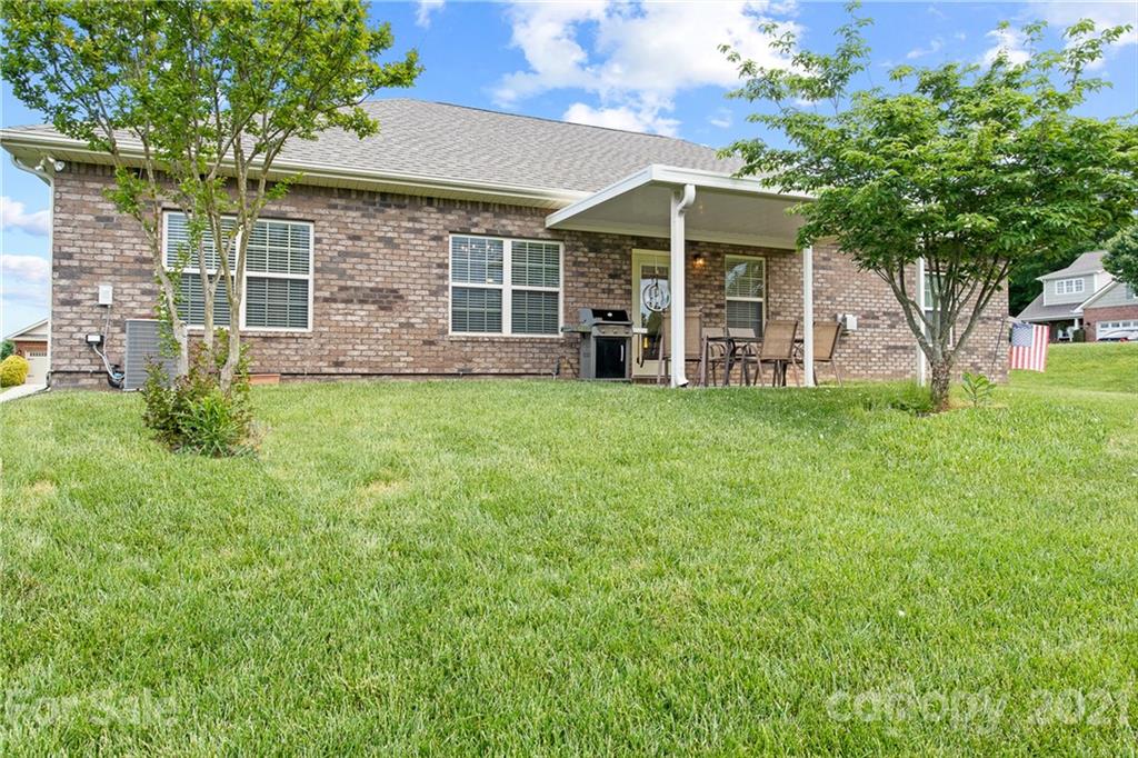 7266 Kenyon Drive Denver, NC 28037 - Photo 11 of 13 front view of a house with a yard