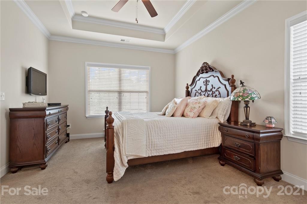 7266 Kenyon Drive Denver, NC 28037 - Photo 6 of 13 a bedroom with a bed and a window