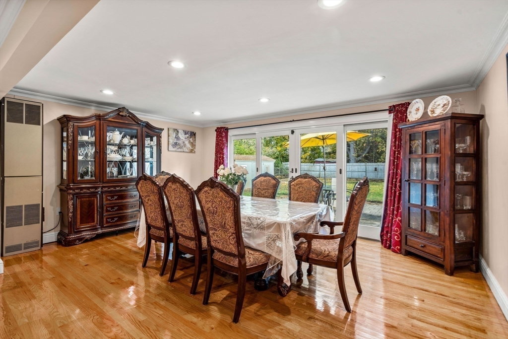13 Sunnyvale Street Beverly, MA 01915 - Photo 12 of 18 a view of a dining room with furniture window and wooden floor