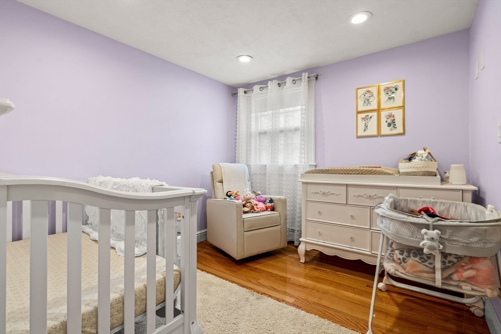 13 Sunnyvale Street Beverly, MA 01915 - Photo 15 of 18 a bedroom with furniture and a window