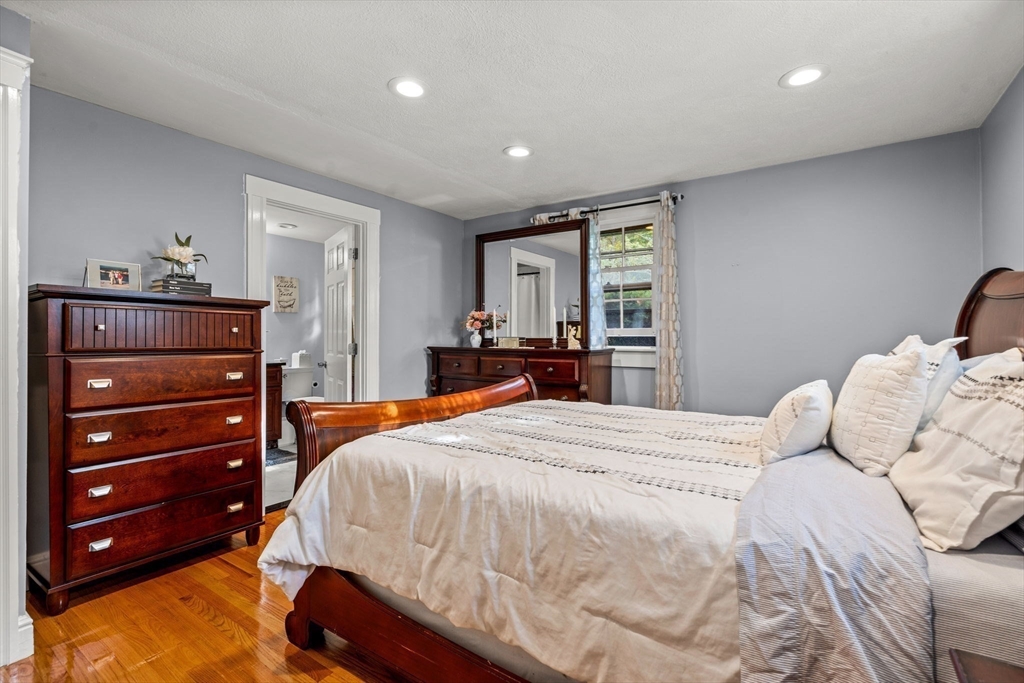 13 Sunnyvale Street Beverly, MA 01915 - Photo 16 of 18 a bedroom with a bed and a dresser