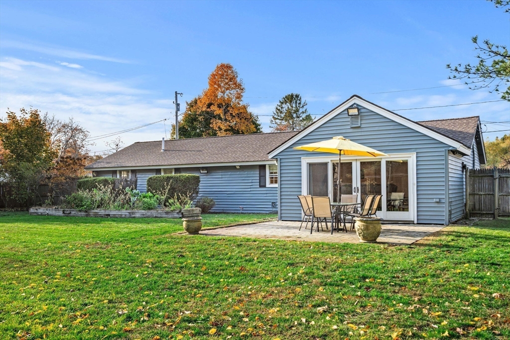13 Sunnyvale Street Beverly, MA 01915 - Photo 2 of 18 a front view of a house with garden