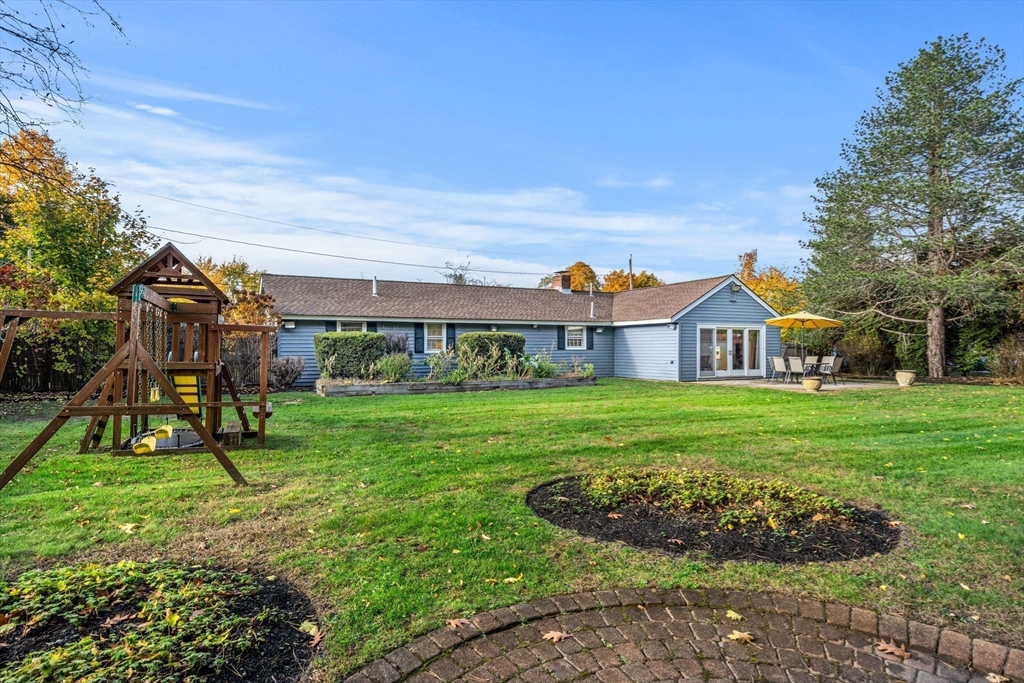 13 Sunnyvale Street Beverly, MA 01915 - Photo 4 of 18 a view of a house with a yard