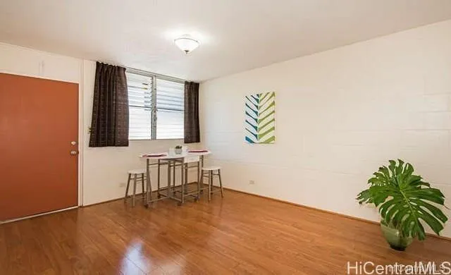 a workspace with furniture and window