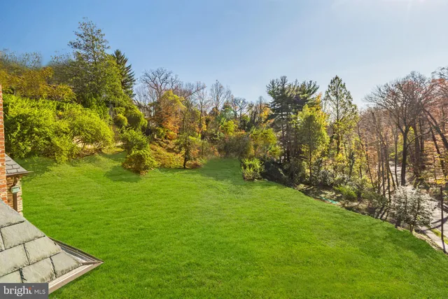 a view of a golf course with a lake