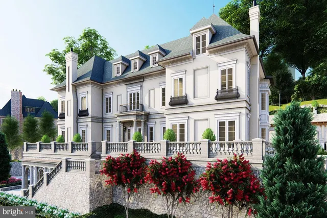 a front view of a building with a garden and plants