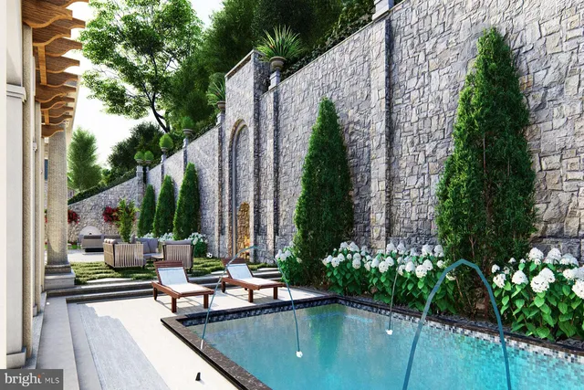a swimming pool with outdoor seating and plants