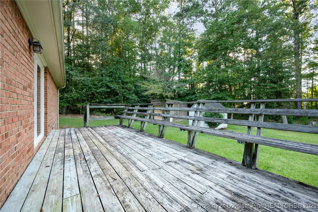 2470 Hickory House Road Sanford, NC 27332 - Photo 21 of 27 a view of deck with wooden floor and fence