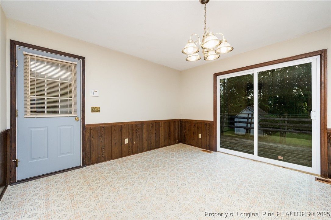 2470 Hickory House Road Sanford, NC 27332 - Photo 6 of 27 a bedroom with a bed and a window