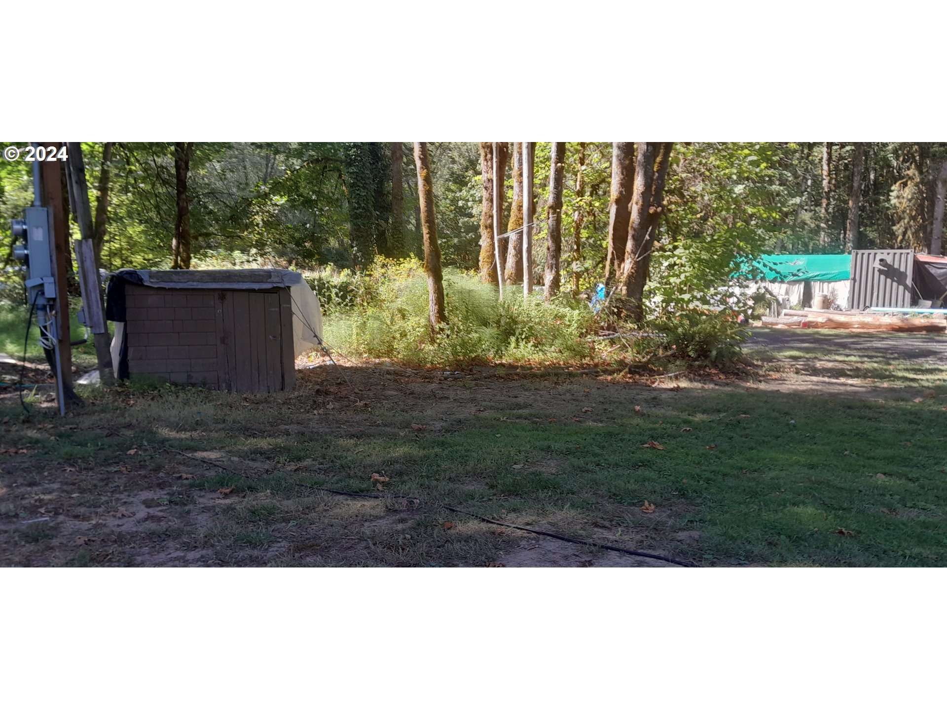 24111 Northwest Meacham Road North Plains, OR 97133 - Photo 12 of 35 a view of a backyard with garden