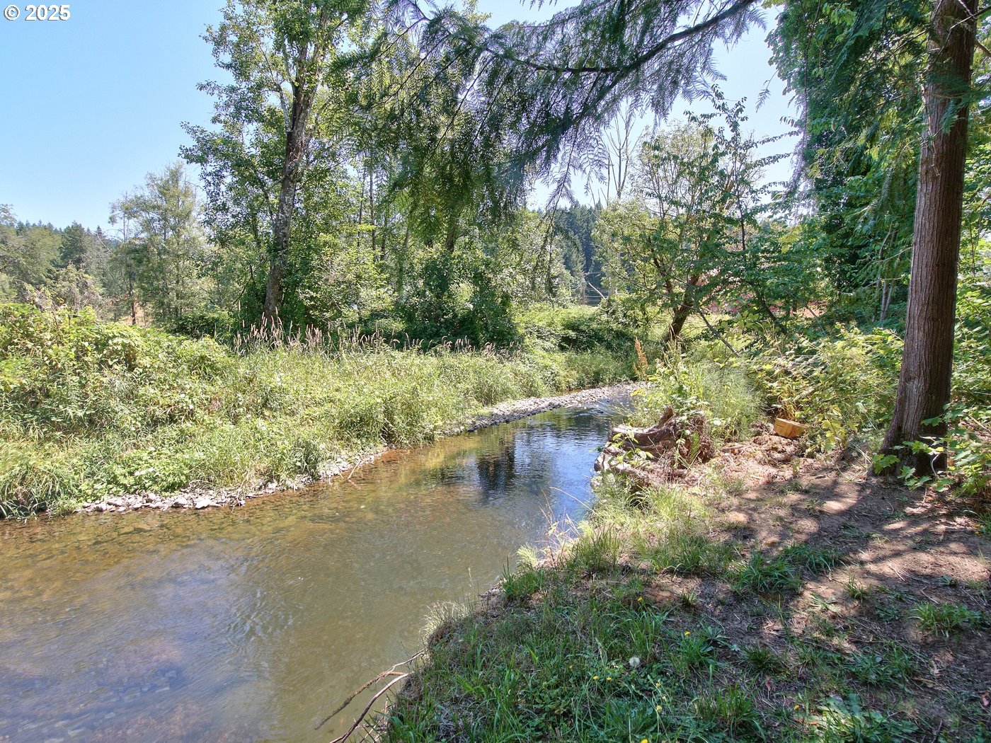 24111 Northwest Meacham Road North Plains, OR 97133 - Photo 26 of 35 a view of a lake with green space