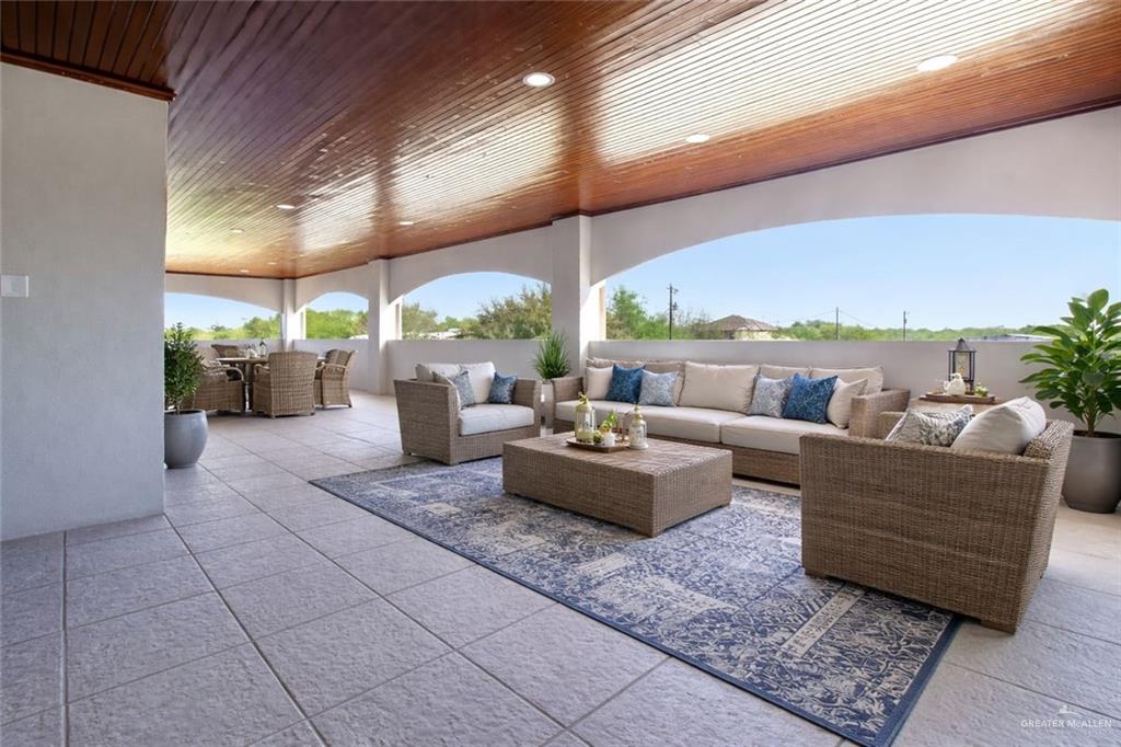 2204 East Trenton Road Edinburg, TX 78542 - Photo 29 of 37 a living room with patio furniture and a potted plants