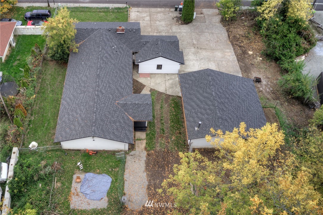 10222 Golden Given Road East Tacoma, WA 98445 - Photo 21 of 23 an aerial view of a house with a yard and garden