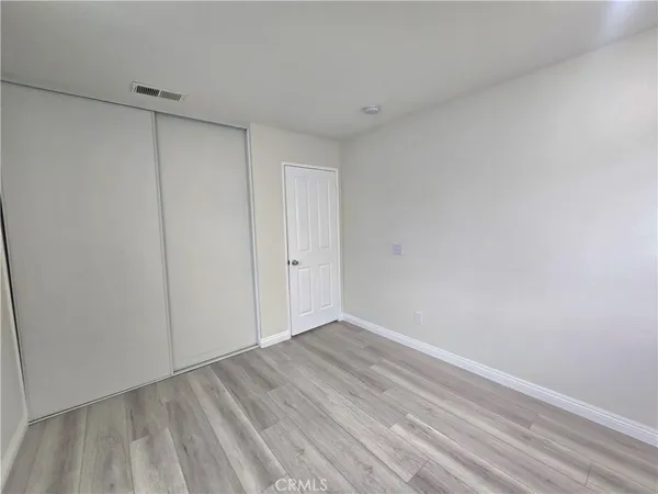 a view of room with walk in closet