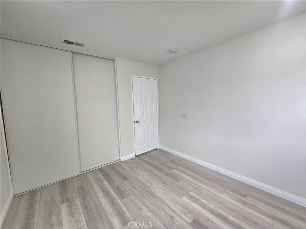 3073 Snowdrop Court Perris, CA 92571 - Photo 13 of 25 a view of room with walk in closet