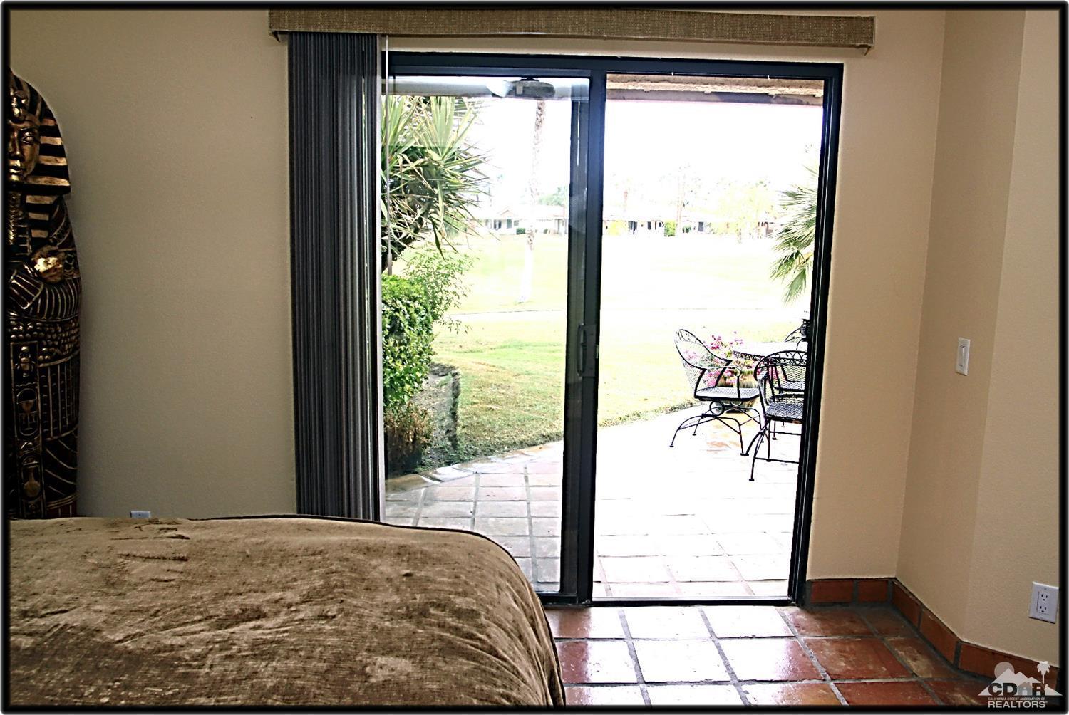 42872 Scirocco Road Palm Desert, CA 92211 - Photo 18 of 23 a view of a room with a large window