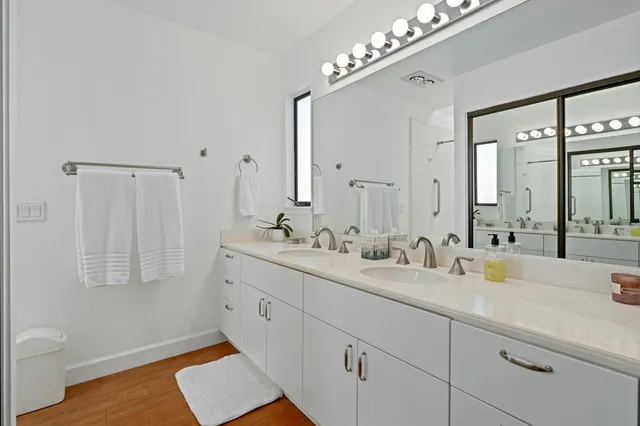 a view of a chairs and table in patio