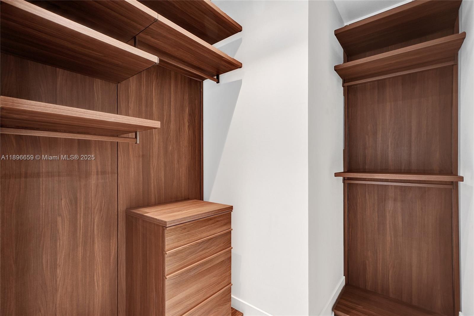 17475 Collins Avenue, Unit 2302 Sunny Isles Beach, FL 33160 - Photo 17 of 42 a view of walk in closet