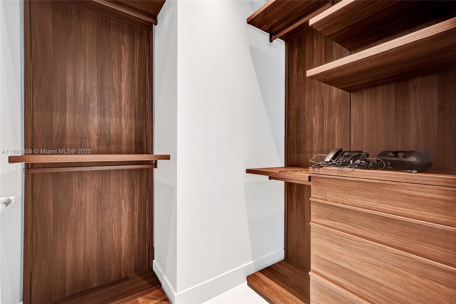 17475 Collins Avenue, Unit 2302 Sunny Isles Beach, FL 33160 - Photo 20 of 42 a view of walk in closet