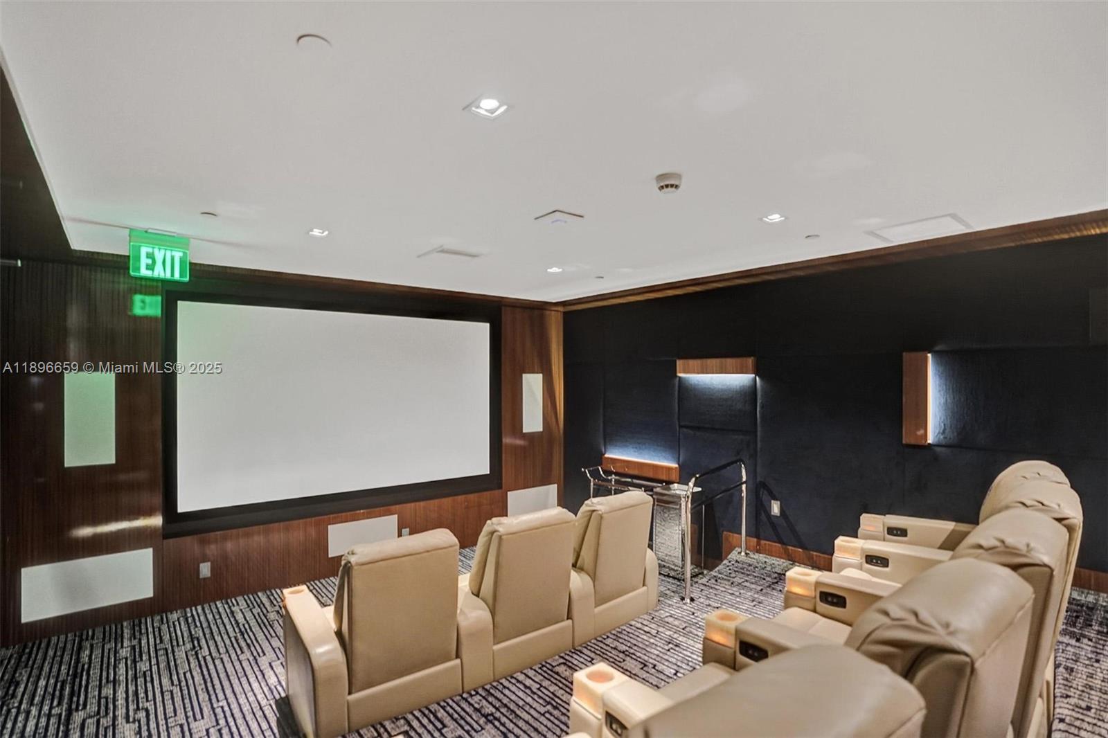 17475 Collins Avenue, Unit 2302 Sunny Isles Beach, FL 33160 - Photo 34 of 42 a living room with furniture and a flat screen tv