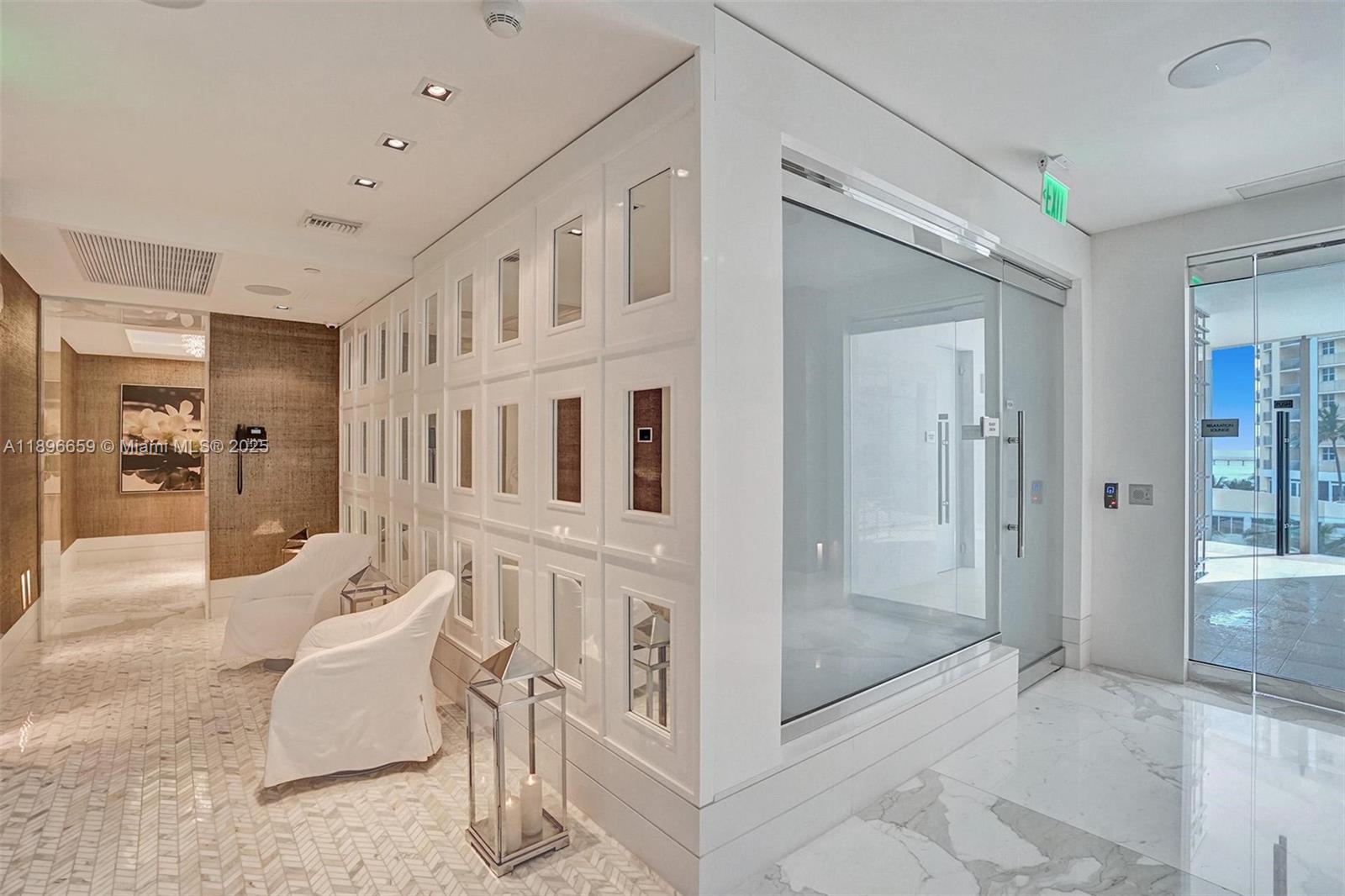 17475 Collins Avenue, Unit 2302 Sunny Isles Beach, FL 33160 - Photo 41 of 42 a living room with furniture