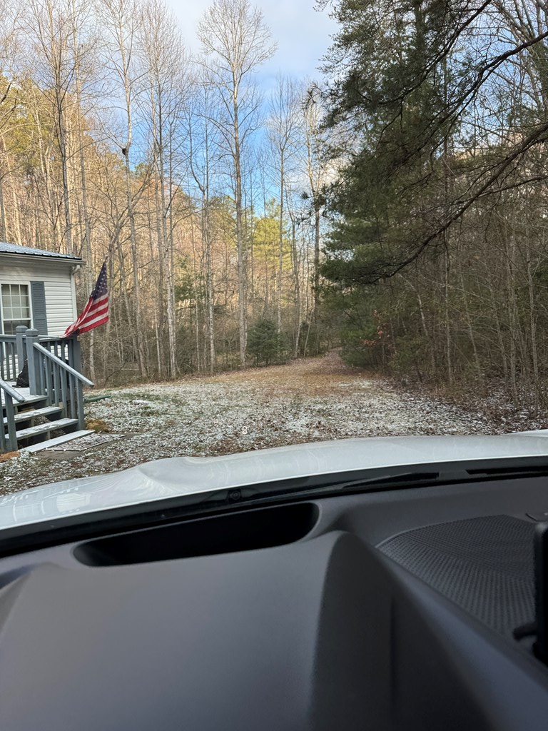 0 Shuler Mountain Road Murphy, NC 28906 - Photo 3 of 14 a view of a yard and car parked