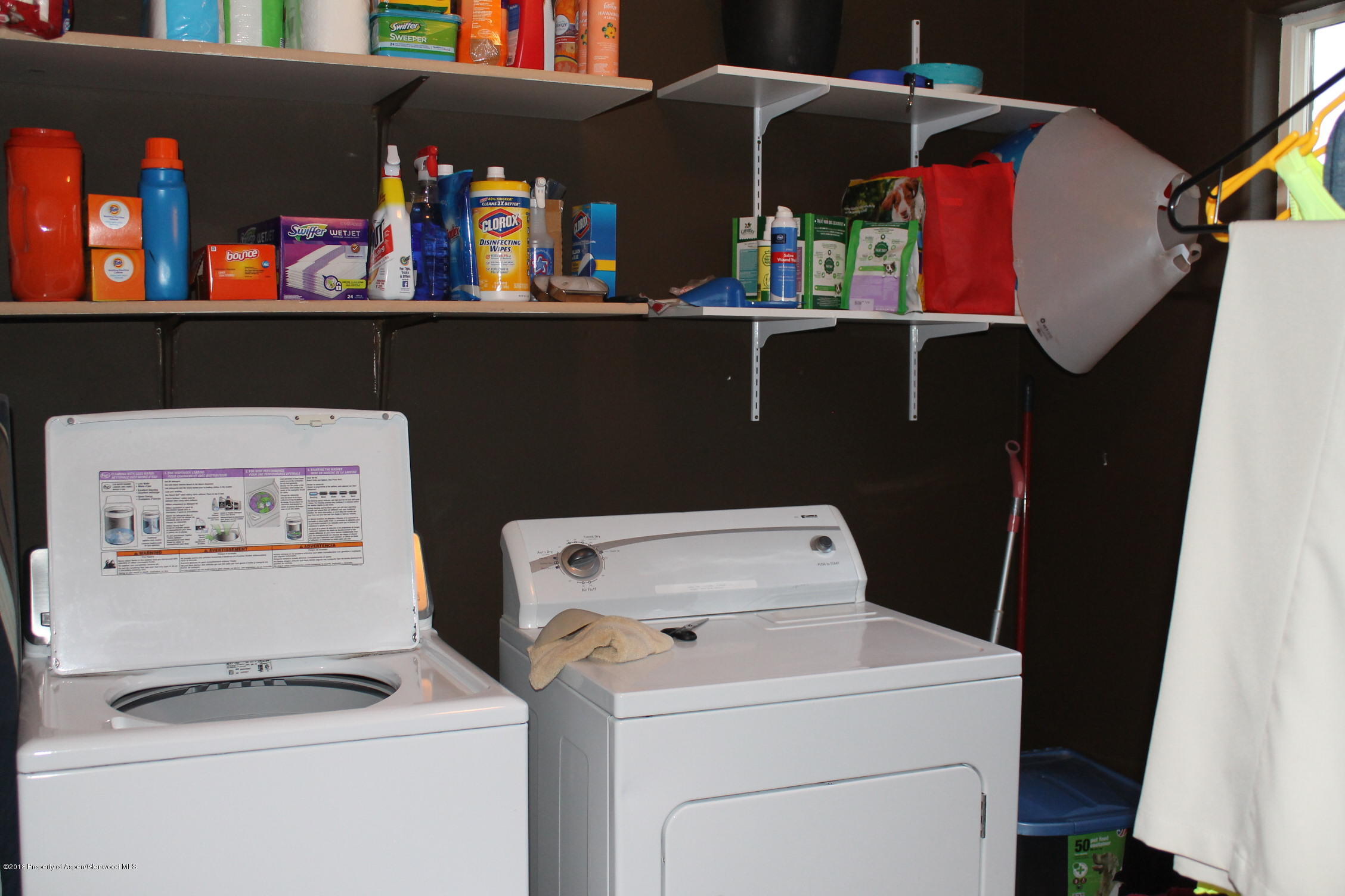 402 Columbine Court Rifle, CO 81650 - Photo 6 of 19 a utility room with dryer and washer