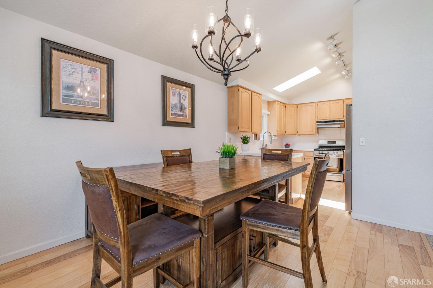 472 Copeland Street Pacifica, CA 94044 - Photo 11 of 31 a view of a dining room with furniture and wooden floor