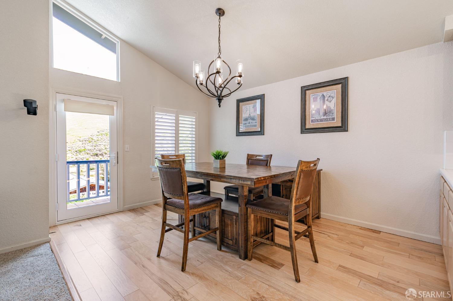 472 Copeland Street Pacifica, CA 94044 - Photo 12 of 31 a view of a dining room with furniture window and wooden floor