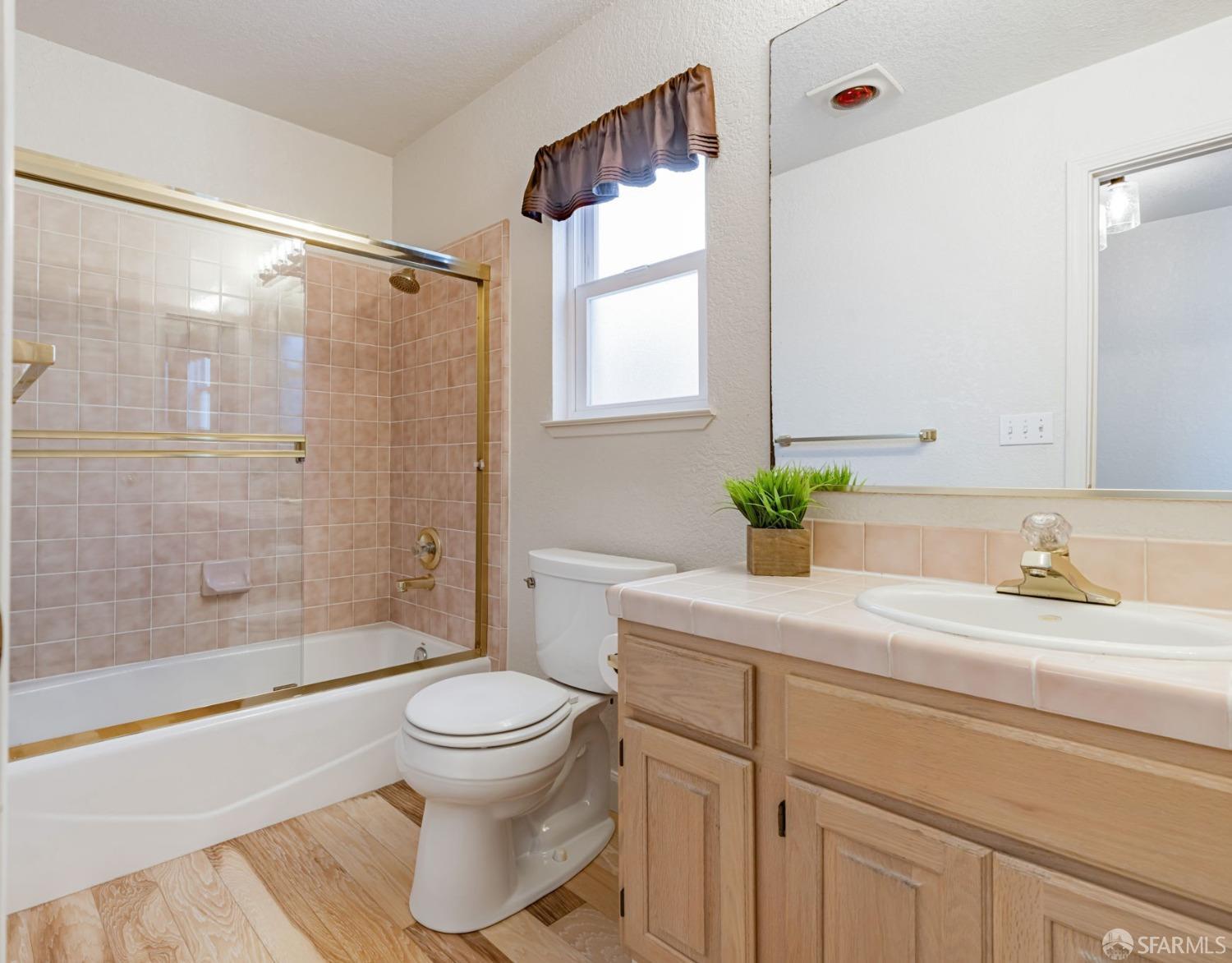 472 Copeland Street Pacifica, CA 94044 - Photo 20 of 31 a bathroom with a sink toilet and shower