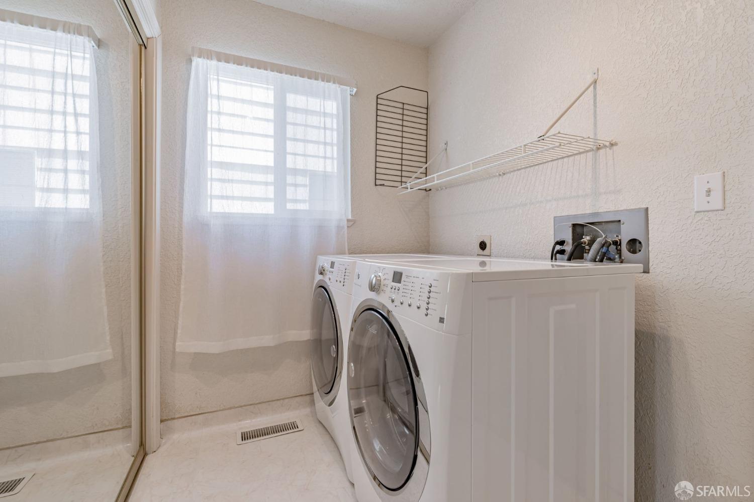 472 Copeland Street Pacifica, CA 94044 - Photo 22 of 31 a utility room with dryer and washer