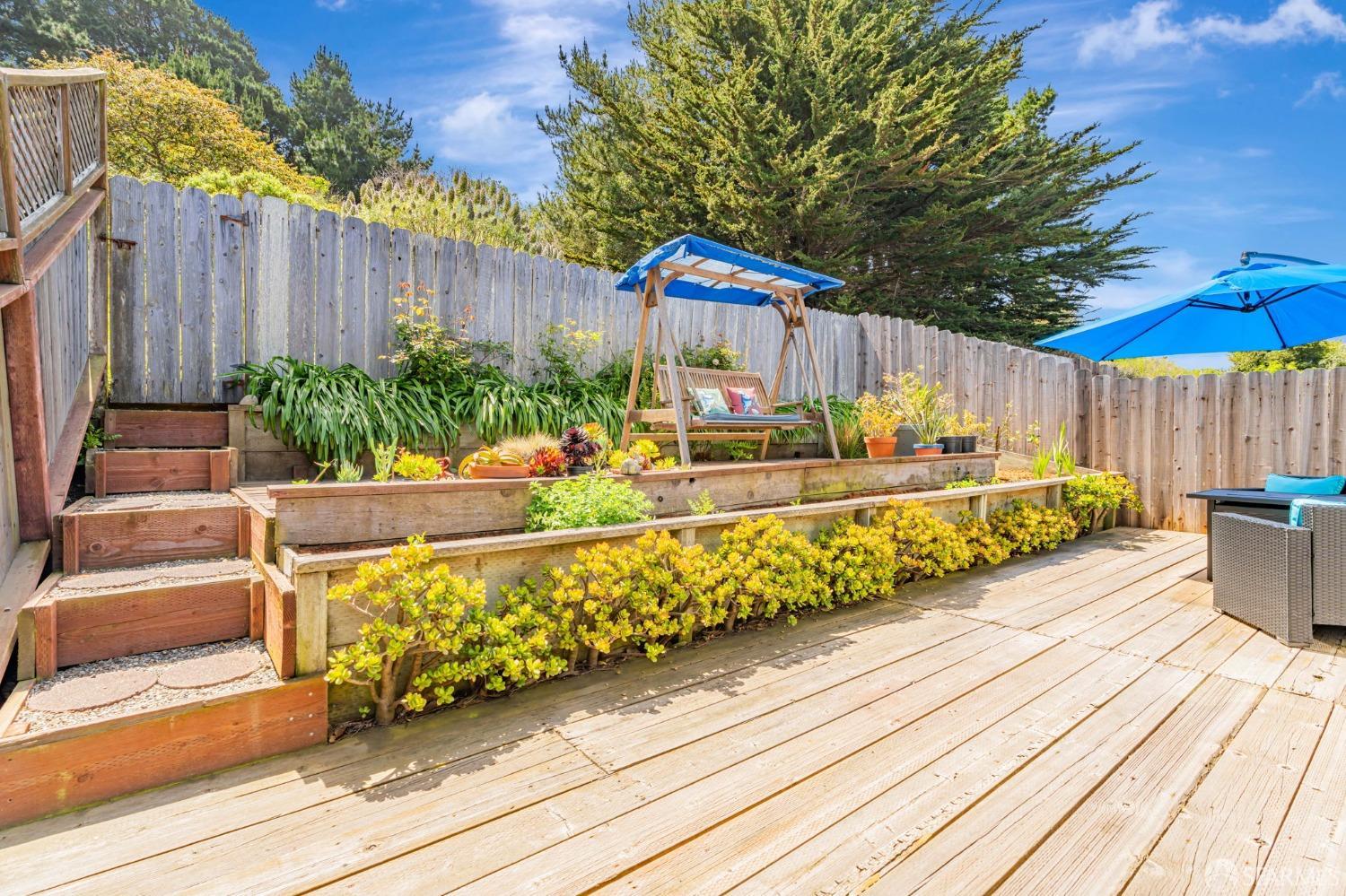 472 Copeland Street Pacifica, CA 94044 - Photo 26 of 31 a view of a backyard with sitting area